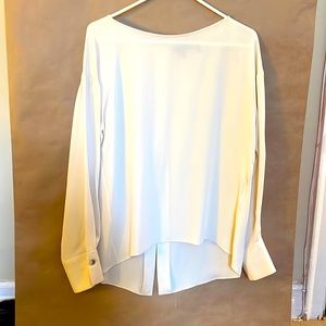 Theory blouse in cream with a split one button back. 100% silk size small